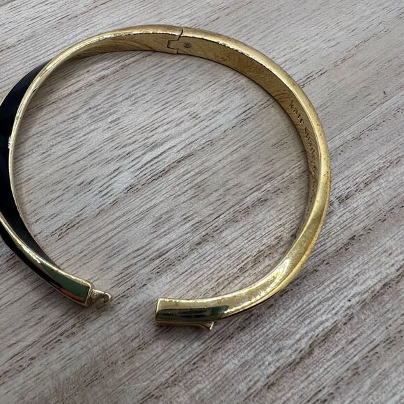 Kate Spade New York Black Enamel and Gold Tone Wave Twist Bangle Bracelet - Picture 10 of 11